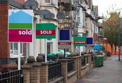 Houses with sold signs