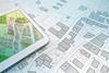 Street plans with tablet shutterstock_2266106503 Francesco Scatena