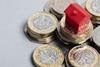 House on money pile