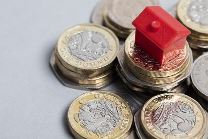 House on money pile
